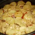 Ovenschotel met kip, aardappelen en bospaddenstoelen