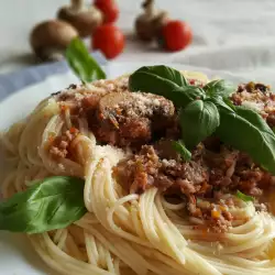 Spaghetti met bolognesesaus en champignons