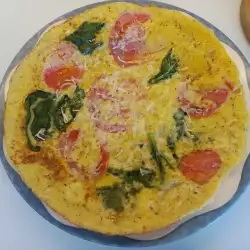 Snelle omelet met spinazie en tomaat