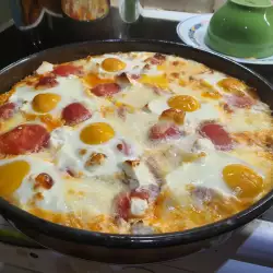 Ovenschotel met eieren, tomaat en kaas