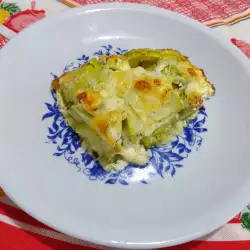 Ovenschotel met courgette, witte kaas en gele kaas