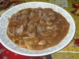 Gebakken nieren met champignons en ui