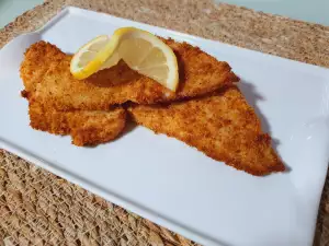 Gepaneerde heek uit de hetelucht friteuse