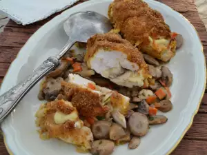 Gepaneerde kipfilet met champignons