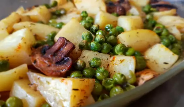 Aardappelen, champignons en erwten uit de oven