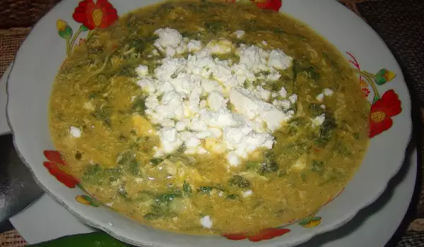 Dikke bloempap met spinazie, witte kaas en eieren