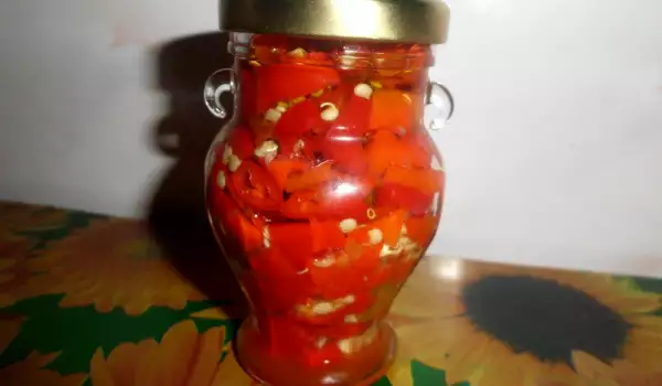 Rode pepers in olijfolie