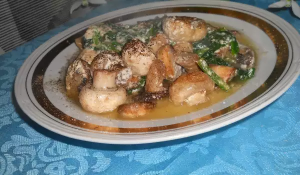 Gestoofde champignons met spinazie en kookroom