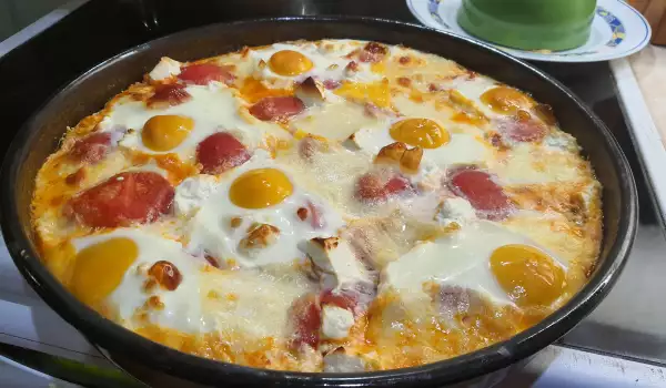 Ovenschotel met eieren, tomaat en kaas