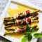 Asperges met ham in een honingsaus