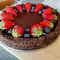 Chocoladetaart met johannesbrood en bessen
