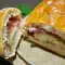 Hartige rol met ham en zure room