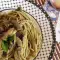 Spaghetti met champignons en pesto