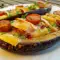 Geroosterde aubergine met kip, cherrytomaten en brie