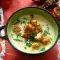 Aardappelcrèmesoep met gesmolten kaas en croutons