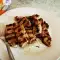 Varkenssteaks in honingmarinade