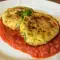 Courgette en kaaspasteitjes in tomatensaus