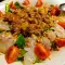 Warme salade met champignons en gerookte kabeljauw