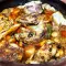 Konijn met champignons en aardappelen
