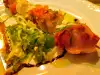Spiesjes met gerookte zalm en octopus