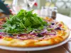 Op welke temperatuur moet pizza gebakken worden?