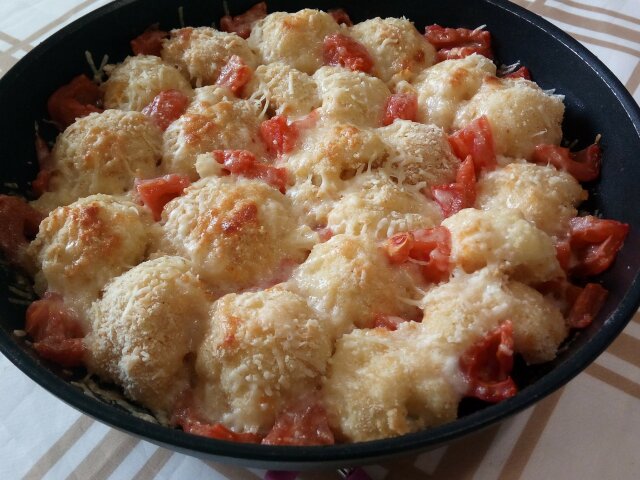 Bloemkool met tomaten uit de oven